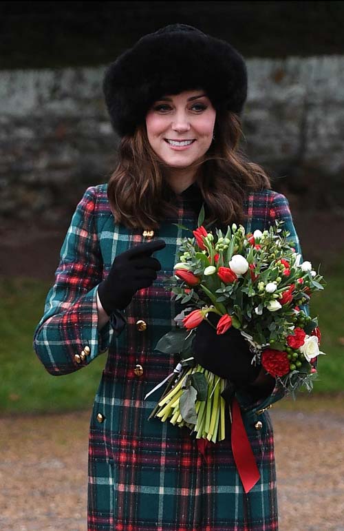 Кейт Миддлтон, как и другие члены королевской семьи, может позволить себе меховую шапку или оторочку мехом на пальто – не более. Globallookpress.com