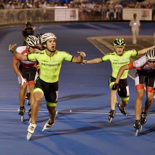 Дело в том, что он один из сильнейших спортсменов мира в беге на роликовых коньках. Ролики в олимпийскую программу не входят, а почувствовать себя причастным к большому спорту так хочется.