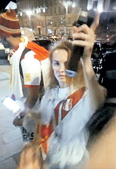 Кадр видеосъёмки с рейда сторонников национал-патриархата. Девушке после публикации видео в социальных сетях за связь с иностранцем устроили травлю