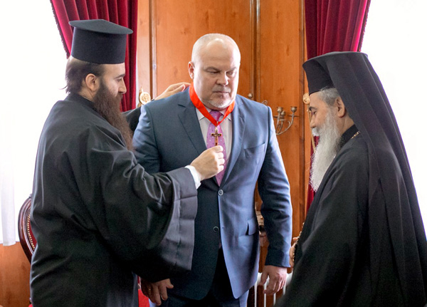 Андрей Кудин и какие-то греческие попы: награда нашла героя